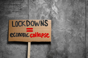 Protestive placard against coronavirus lockdowns close up