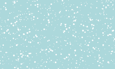 Snow background. Winter snowfall. White snowflakes on blue sky. Christmas background. Falling snow.