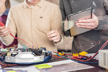 a team of engineers working on a new prototype