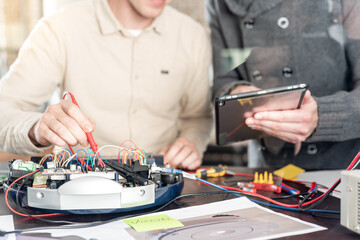 a team of engineers working on a new prototype