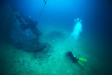 Fototapeta na wymiar shipwreck diving landscape under water, old ship at the bottom, treasure hunt