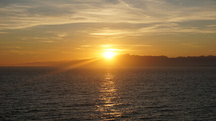 sunset over the sea side