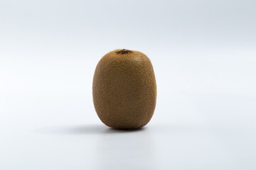 Green kiwi on white background © Veronica Glez
