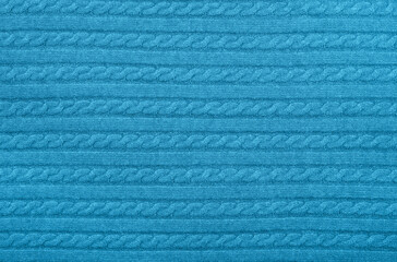 Background texture of blue knitted wool fabric