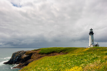copyspace Yaquina Head Lighthouse under cloudy skies