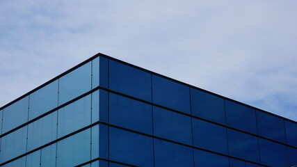 Fototapeta na wymiar building roof glass facade against sky background