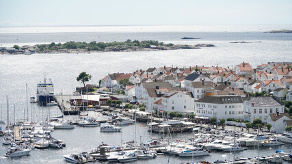 City overview with a port by the sea