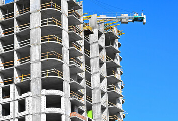 Crane and highrise construction site