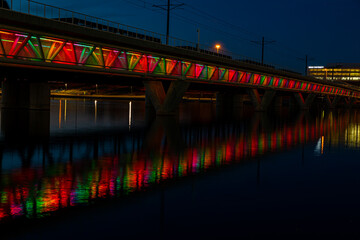 Fototapeta na wymiar Bridges at Tempe Town Lake at night with lights