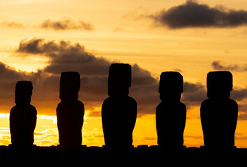 Moai silhouette at sunrise in Ahu Tongariki at Easter Island, Rapa Nui