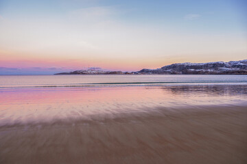 Arctic beach in Teriberka. Wonderful Arctic sunset landscape on the Barents sea