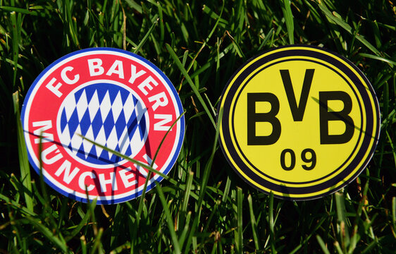 September 6, 2019, Munich, Germany. Emblems Of German Football Clubs Bayern Munich And Borussia Dortmund On The Green Lawn