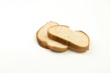 Wheat food concept, sliced bread on white isolated background