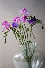 Fototapeta na wymiar bouquet of blue flowers on neutral backdrop