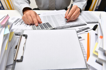 business concept, blank paper sheet with copy space for text - businessman working with reports in...