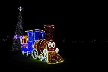 Christmas decorations in the form of a small locomotive