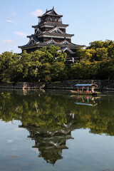 Fototapeta na wymiar reflection of Japanese castle