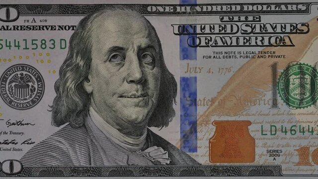 Portrait Of Ben Franklin expressing different emotions to camera. One hundred dollar.
Animation of close-up of US one hundred dollar bill. 
