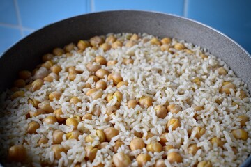 Rice cooked together with chickpea at home