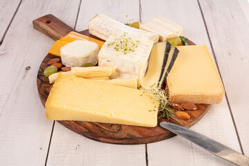 Assorted cheeses on a board