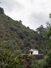 The Chapel of Our Lady of Piety, one of the four chapels of the Sanctuary of Our Lady of Piety. Located on the summit of the cliff, with a rustic staircase as access.
Serra da Lousã, Portugal.