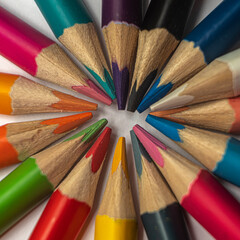 Naklejka premium colored pencil in close up on neutral background