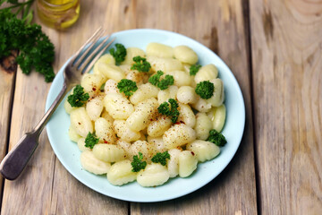 Gnocchi on a plate. Italian Cuisine.