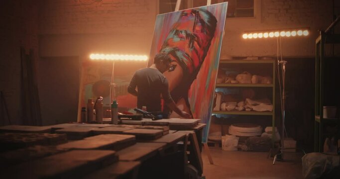 Man creating portrait of black woman