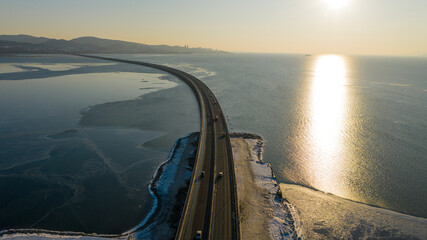 Winter views of The Amur Bay Bridge, photographed on a drone
