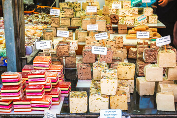 Different traditional sweets on a stall of an oriental bazaar