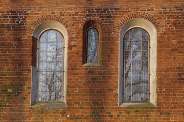 windows in a thirteenth-century Romanesque church in Rokicie, Poland