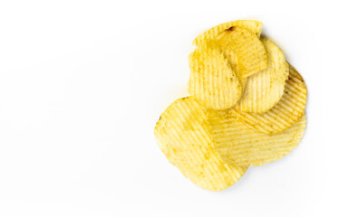 Potato chips isolated on white background. wafer-thin slice of potato fried or baked until crisp and eaten as a snack.