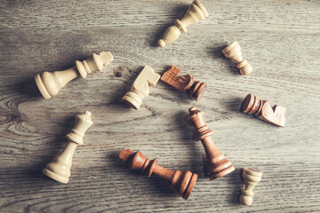 chess pieces on the wooden table