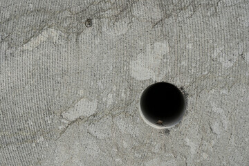 Granite stone texture close-up, with a sample hole, background