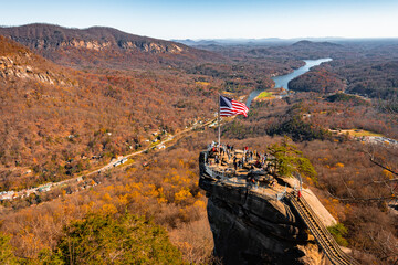 Fototapeta premium Chimney Rock at Chimney Rock State Park and Lake Lure, North Carolina,USA in fall season.
