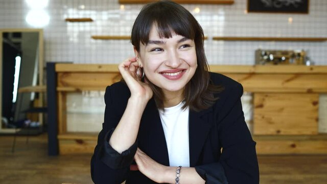 Young female candidate interviewed by employer. Portrait