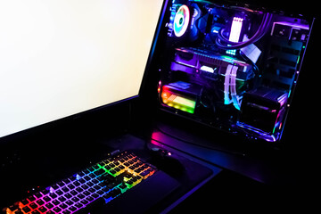 Fototapeta na wymiar gaming workstation rendering computer with colorful keyboard