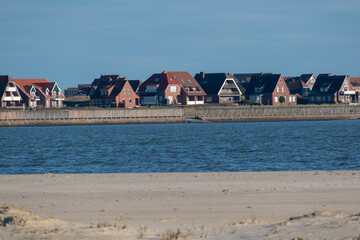 Cozy houses at the coast of the East Frisian Island Norderney, Germany