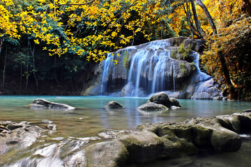 Waterfall in autumn forest at Erawan waterfall National Park, Thailand