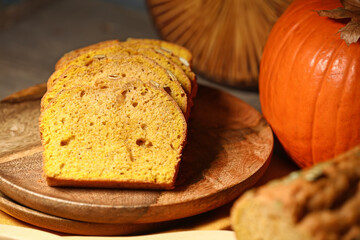Tasty pumpkin pie on table
