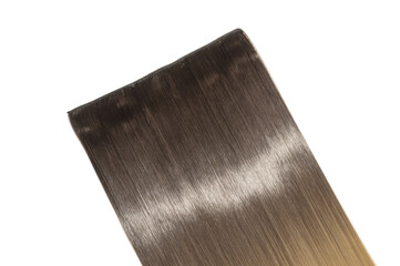 close up texture of single piece clip in straight black  blended to blonde two tone ombre style...