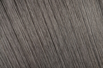 close up texture of single piece clip in straight black blended to honey blonde two tone ombre...