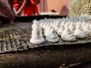 Bori is a form of dried lentil dumplings popular in Bengali cuisine. It is made from a paste of urad dal and winter melon which is sun-dried for 3–5 days.