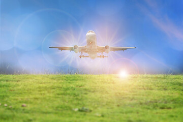 Passenger or commercial plane on tropical forest and blue sky background, business journey transportation concept happiness holiday travel idea