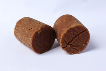 palm sugar brown color with isolated background