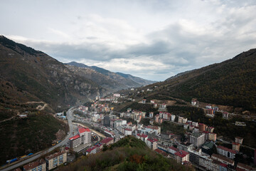 Fototapeta na wymiar Top view cityscape of the town lies between the valleys Macka Trabzon Turkey