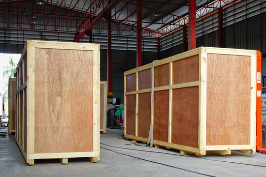 Wooden Boxes In Warehouse With Condenser Coils Inside Are Being Prepared Delivery To Customer.