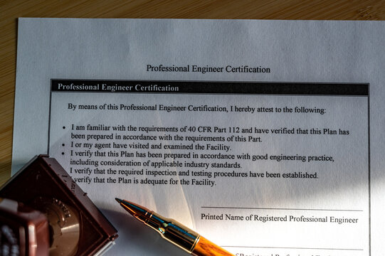 Selective focus on generic professional engineer, architecture. or surveyor stamp and certification statement