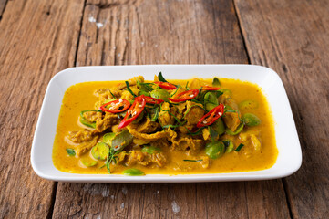 Spicy stir fried pork with Cluster Bean (Bitter Bean or stink beans) popular southern Thai food on...