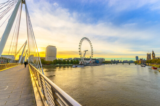 London Eye seen from Jubilee bridge at sunrise: London, England - November, 2015